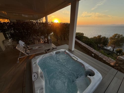 Private jacuzzi at sunset overlooking the sea from Villa D'Alessandro apartment in Anacapri, Italy