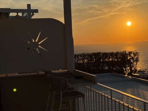 Sunset view from private balcony at Villa D'Alessandro in Anacapri with sea views and jacuzzi area