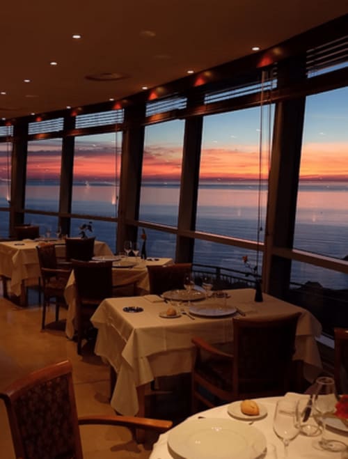Elegant fine dining restaurant with sunset views at Clos Céleste, Etretat