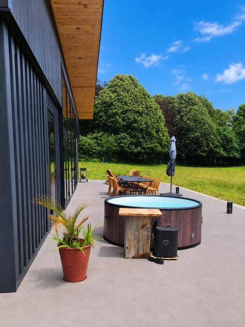 Modern cottage with terrace and pool at Le Village Du Moulin in Sizun