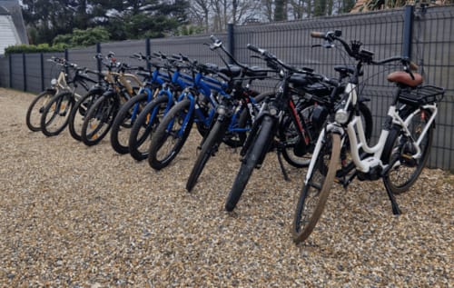 Row of bikes parked at Clos Céleste countryside lodging in Ecrainville