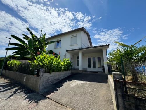 Villa des Palmiers, gîte avec plantes tropicales en façade, Villeneuve-sur-Lot