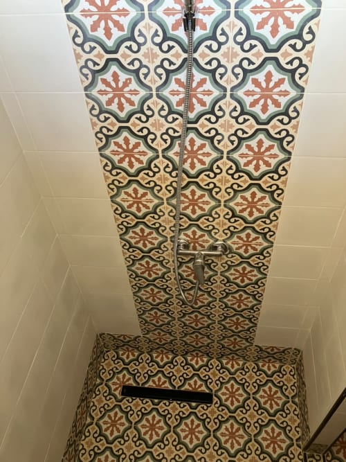 Decorative tile shower in YaYaCaSa Ocre apartment at SAMYAflat, Tangier with traditional Moroccan geometric patterns