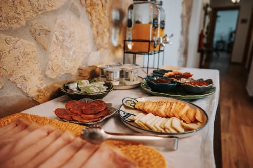 Charcuterie and cheese spread at Casa de Campo da Quinta da Pegada B&B in Óbidos, Portugal
