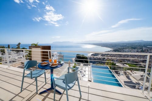 Junior Suite balcony with infinity pool and sea view overlooking Castellammare del Golfo, Sicily
