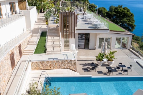Hotel Belvedere Resort infinity pool and terrace overlooking Castellammare del Golfo sea, Sicily