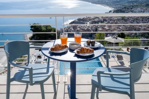 Breakfast on terrace overlooking Castellammare del Golfo bay, Sicily