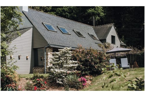 Gîtes du Bulz B&B in Pleyber-Christ, France with stone cottage, solar panels, gardens