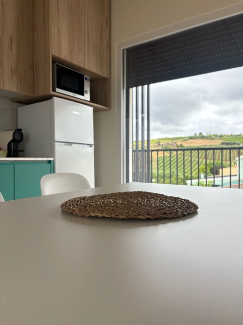 Modern kitchen with countryside views at AL Patio Da Figueira apartment in Torres Vedras, Portugal