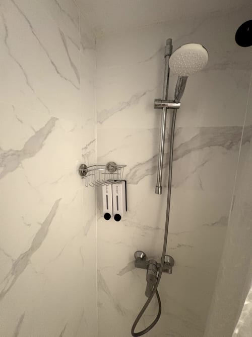 Modern shower with rainfall showerhead and handheld spray at Apartamentos Turísticos Axarent, Almayate Alto