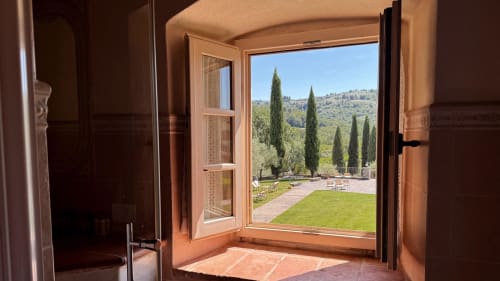 Tuscan villa view from Family Apartment at Borgo di Erboli, Cavriglia - cypress trees and manicured lawn