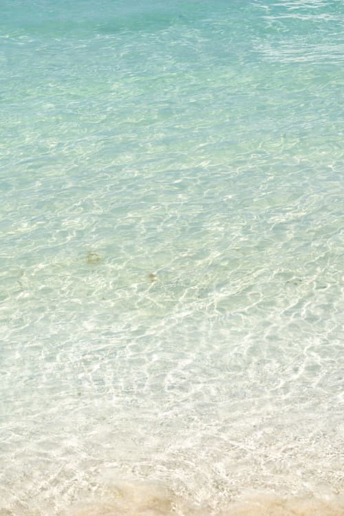 Aguas turquesas cristalinas y playa de arena blanca en Hotel Isla Mujeres Centro, México