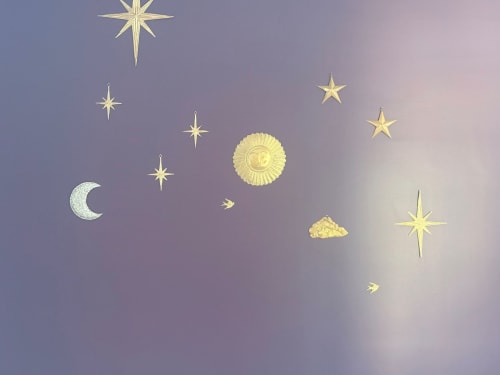 Celestial night sky illustration with crescent moon, sun, stars, and cloud for An heol penthouse, Le Havre