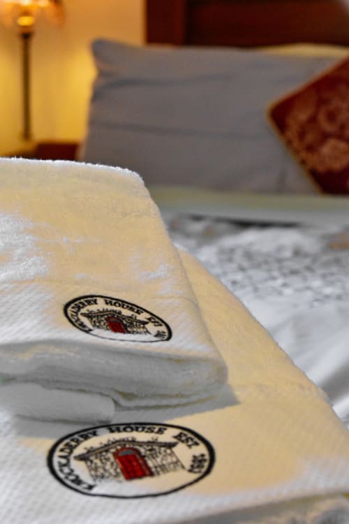 Close-up of towels with Knockaderry House logo at luxury bed and breakfast in Ennis, Ireland