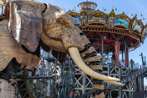 Giant mechanical elephant with carousel at Chateau Haute Roche, Oudon, France attraction