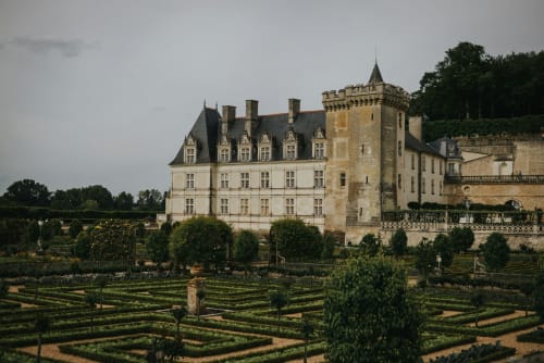 Chateau Haute Roche in Oudon, France with formal gardens and Renaissance architecture