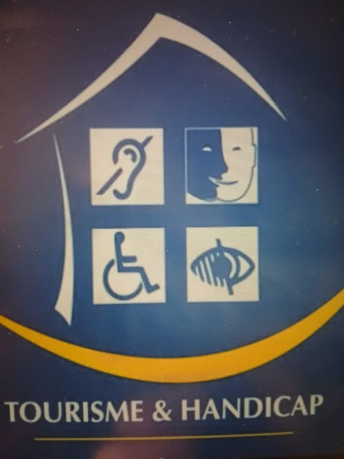 Tourisme & Handicap accessibility logo featuring icons for hearing, speech, mobility, and vision accessibility at Les 3B in