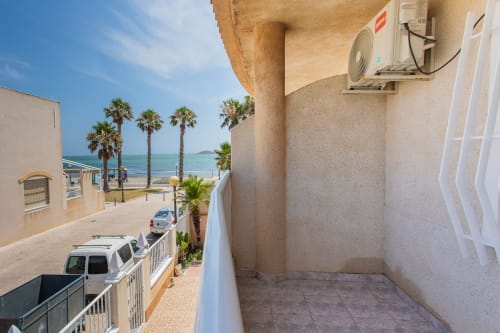 Villa frente al mar en Cartagena con balcón, vista al mar, palmeras y aire acondicionado