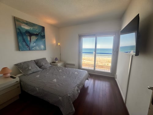 Chambre avec vue sur la mer depuis le balcon de l'appartement Barcaresa au Barcarès, France