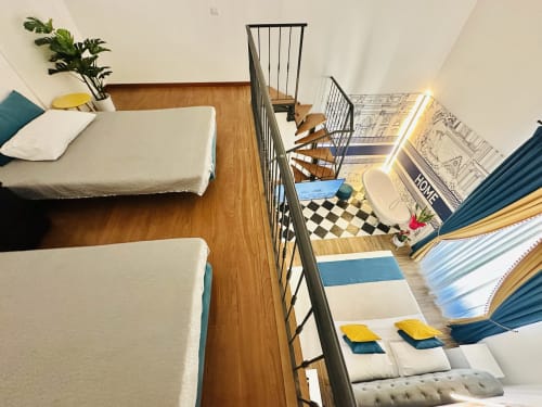 Suite familiare St Mary Major con pavimenti in legno, balcone con vista sulla città, scale e letti