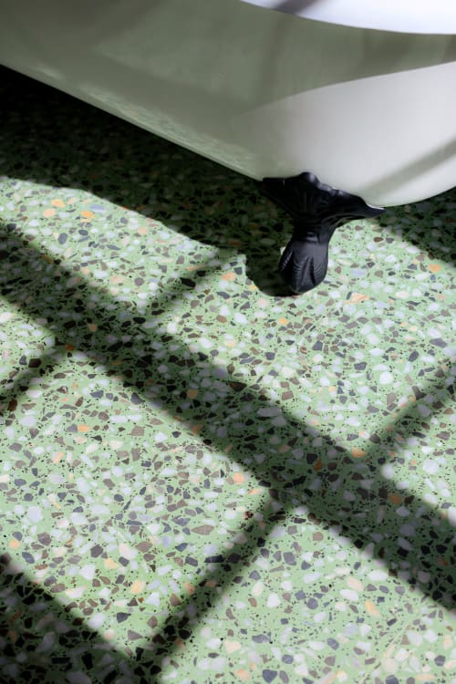 Black horse sculpture on terrazzo floor at Hotel Fragile, Ciutadella de Menorca