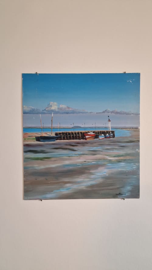 Bateaux de pêche échoués à marée basse à Beauvoir avec montagnes au loin, vue sur la rivière depuis l'Hôtel Rose