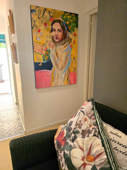 Colorful artwork featuring a woman in headscarf displayed in Art House apartment at Stellenbosch guesthouse