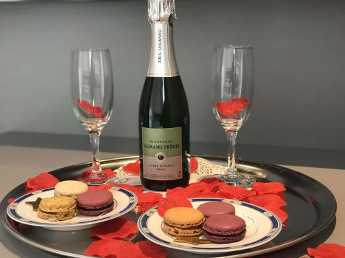 Champagne Legrand Frères with macarons and rose petals at Hôtel De La Fontaine, Nice