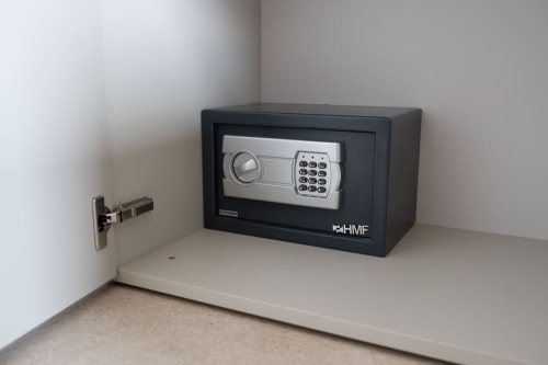 Black HMF digital safe with electronic keypad in Suite Apartment Taormina bedroom