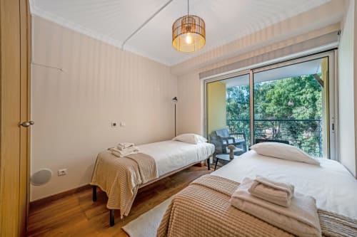 Quarto twin luminoso com vista para o jardim em Atlantic Places, Albufeira, Portugal