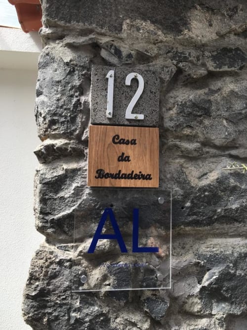 House number 12 plaque for Casa da Bordadeira at BHF Residences in Arco da Calheta, Portugal