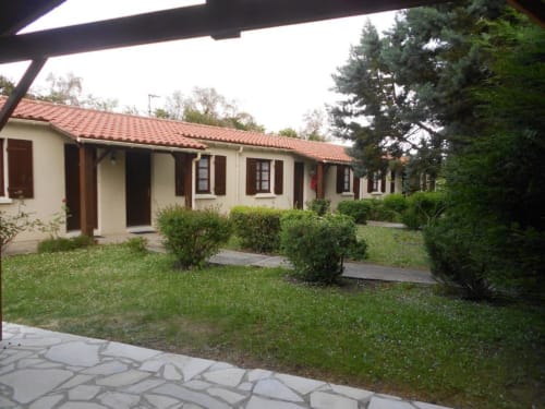 Domaine de la Gare M B&B in Mortagne-sur-Gironde, France - cream-colored cottage with terracotta roof and gardens