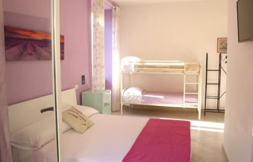 Camera Quadrupla Lavanda presso The Flower Garden B&B a Castellammare di Stabia con letto a castello e letto singolo