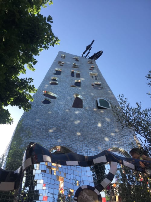 Colorful mosaic tower with windows in Grosseto, Italy near Agriturismo La Tortorella