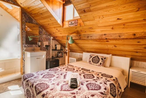 Cozy wooden cabin bedroom at Charme da Graça, Lisboa with double bed and en-suite bathroom