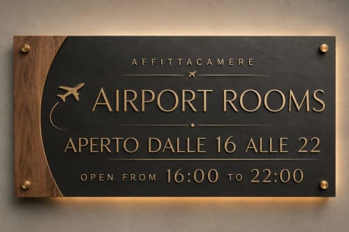 Insegna Affittacamere Airport Rooms Bari con orario 16:00-22:00, design nero e oro su legno