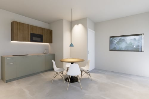 Cucina e zona pranzo moderne presso Riviera Apartments a Pesaro con tavolo rotondo, sedie bianche e attrezzata