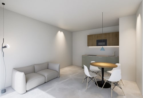 Appartamento moderno a Riviera Pesaro con soggiorno, cucina, tavolo da pranzo, divano e vista sulle montagne