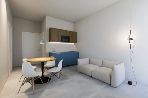 Monolocale moderno a Riviera Apartments a Pesaro con cucina attrezzata, zona pranzo e soggiorno con vista mare