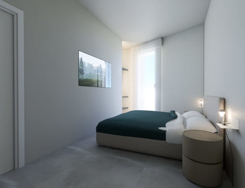 Camera moderna presso Riviera Apartments a Pesaro con letto matrimoniale, TV a parete, balcone con vista mare e arredi contemporanei