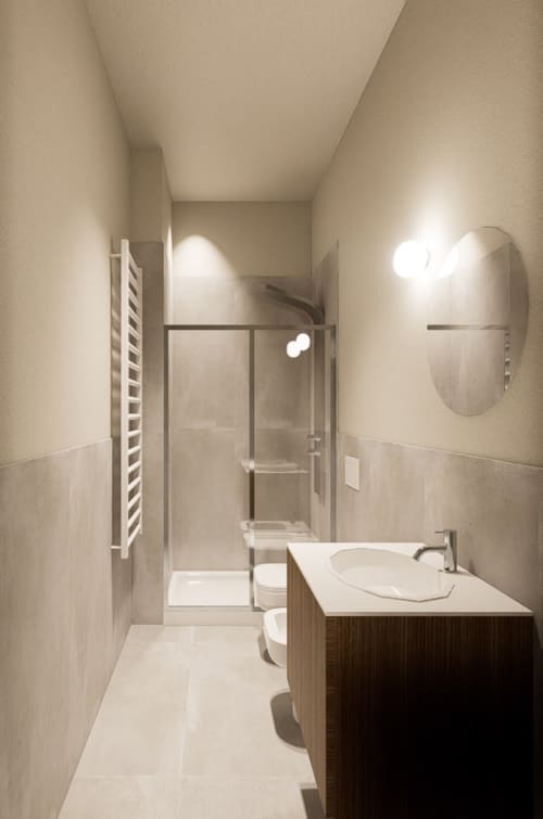 Bagno moderno presso Riviera Apartments Pesaro con lavabo, specchio, WC, box doccia e scaldasalviette