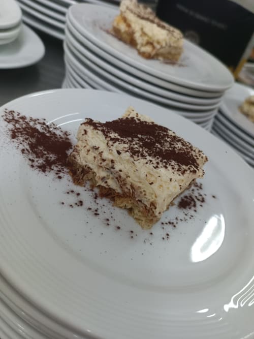 Tiramisu dessert dusted with cocoa served at Hotel Ristorante alle Querce in Castelbuono