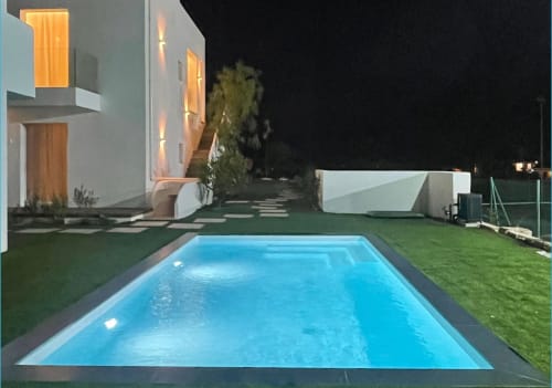 Casa moderna illuminata con piscina riscaldata, prato verde e giardino a Like at Home Palau, Sardegna