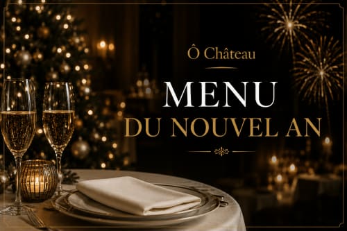 Ô Château New Year menu setting with champagne glasses, elegant place setting, and festive gold décor
