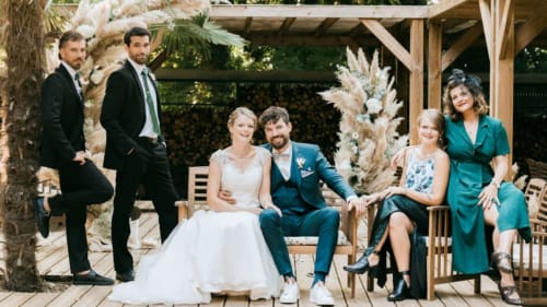 Wedding celebration at Ô Château in Hayange, guests in formal attire enjoying reception