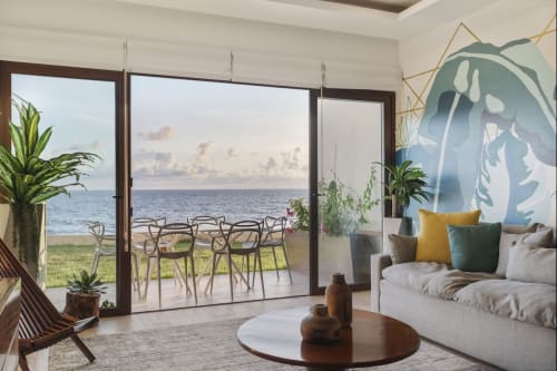 Oceanview apartment living room at Malkita Sol in Isla Mujeres with sea views, modern furnishings, and beach access