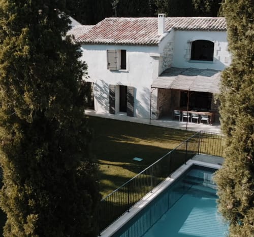 Mas des Ecoliers Provence B&B aerial view with pool, terrace, and whitewashed villa in Chateaurenard