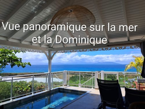 Balcon du Loft Lagon avec jacuzzi vue mer et Dominique, Aux Colibris Amoureux, Grand Bourg