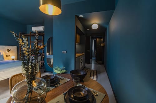 Teal Superior Apartment at Benefit Collection Porto with dining table, kitchenette, and bedroom view
