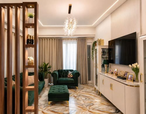 Elegante soggiorno moderno nell'Appartamento Gold di Affittacamere Rozzano, Sharm El Sheikh con sedute in velluto verde e cristalli